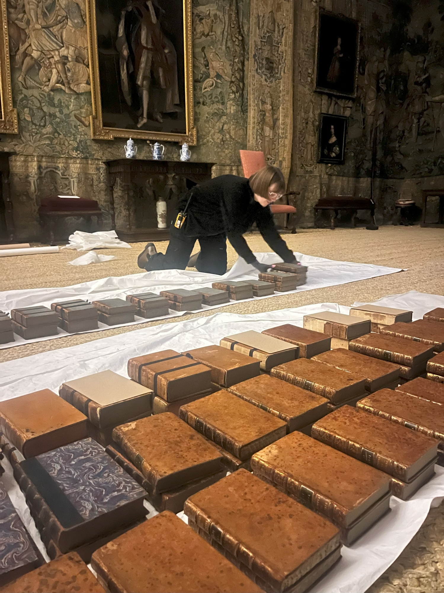 Moving the book collections for safekeeping at Hardwick Hall, Derbyshire. (C) National Trust.jpg