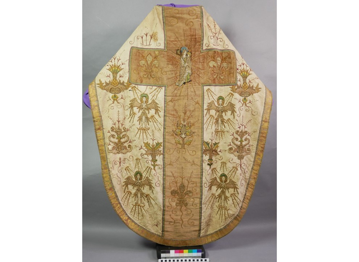 A 16th century chasuble, back before conservation, on an early 20th century mount