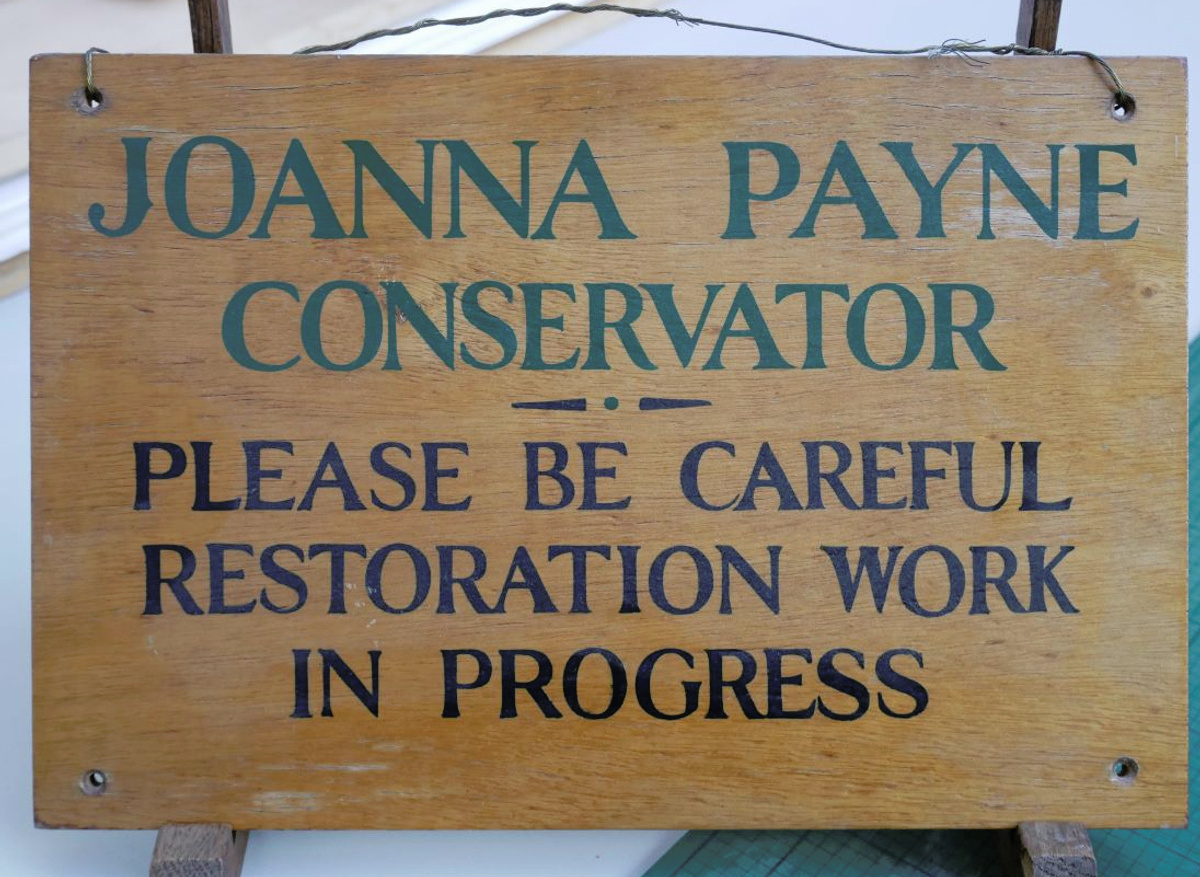 At entrance to the conservation studio