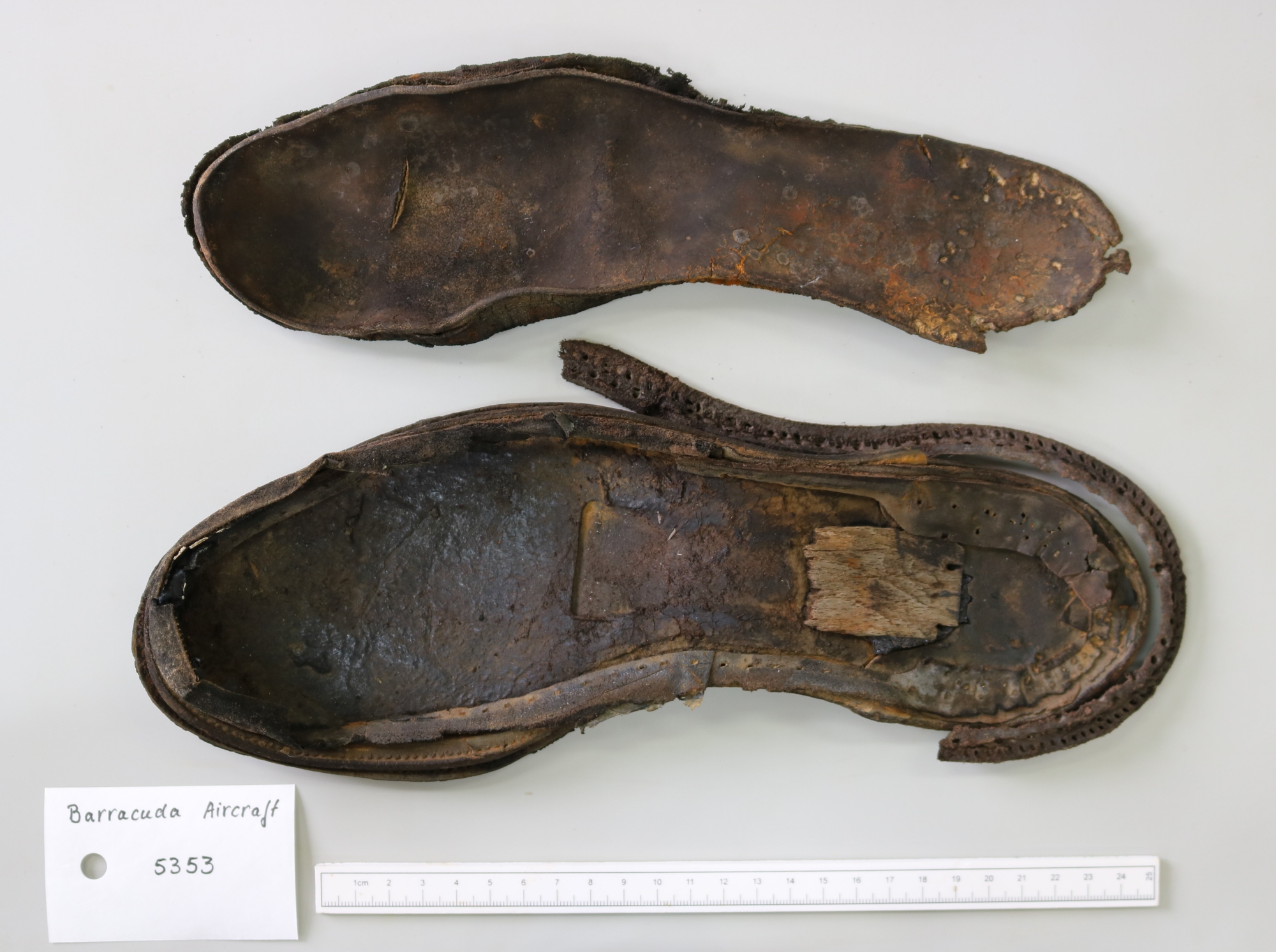 Remains of two items of footwear recovered from the wreck of a Mk. II Fairey Barracuda in 2019 presumed to belong to the pilot.JPG