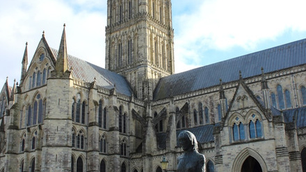 Salisbury Cathedral (https://unsplash.com/photos/a-statue-of-a-woman-in-front-of-a-large-building-yqWa1TDkMWE).jpg