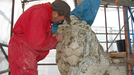 painting a lion sculpture c.Chris Daniels, Osirion.jpeg