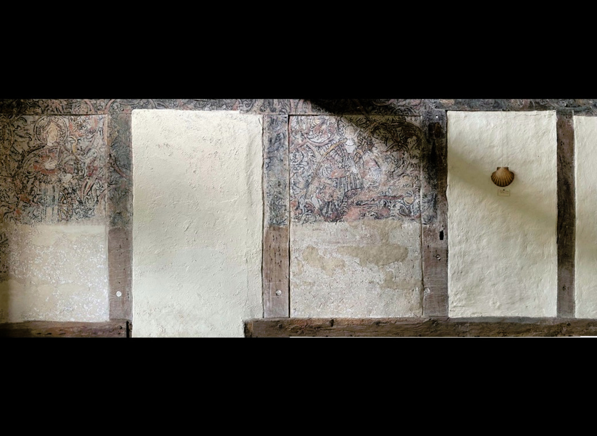 The lower register of paintings at Piccotts End