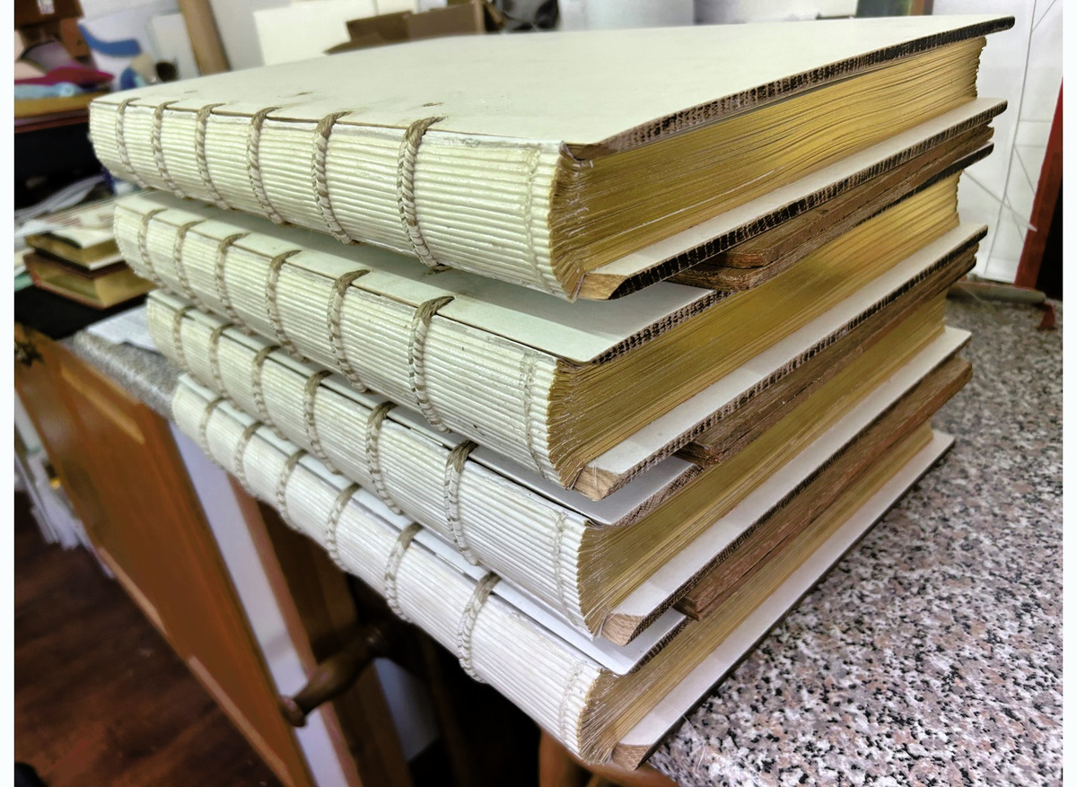 All four volumes with the boards laced on