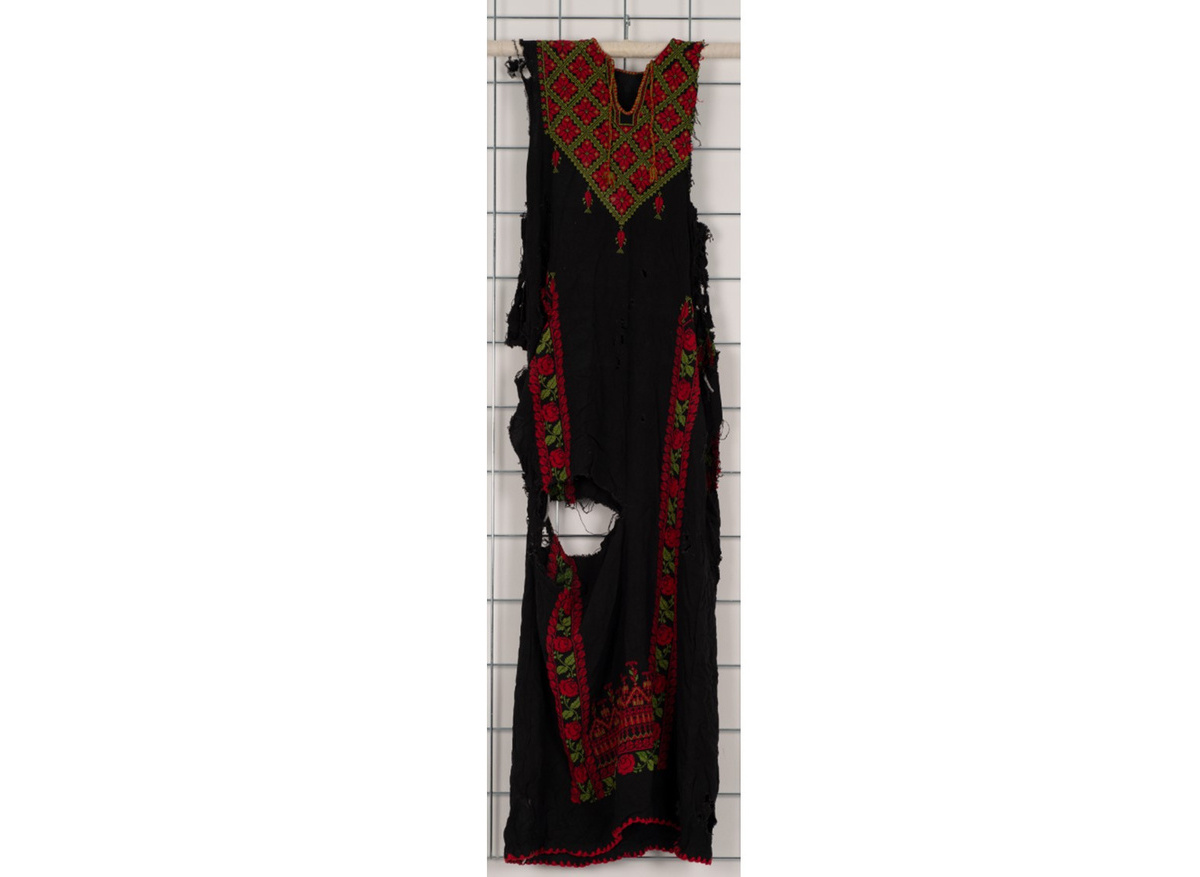 The front of the young woman’s dress recovered from the Rafah Museum, before conservation