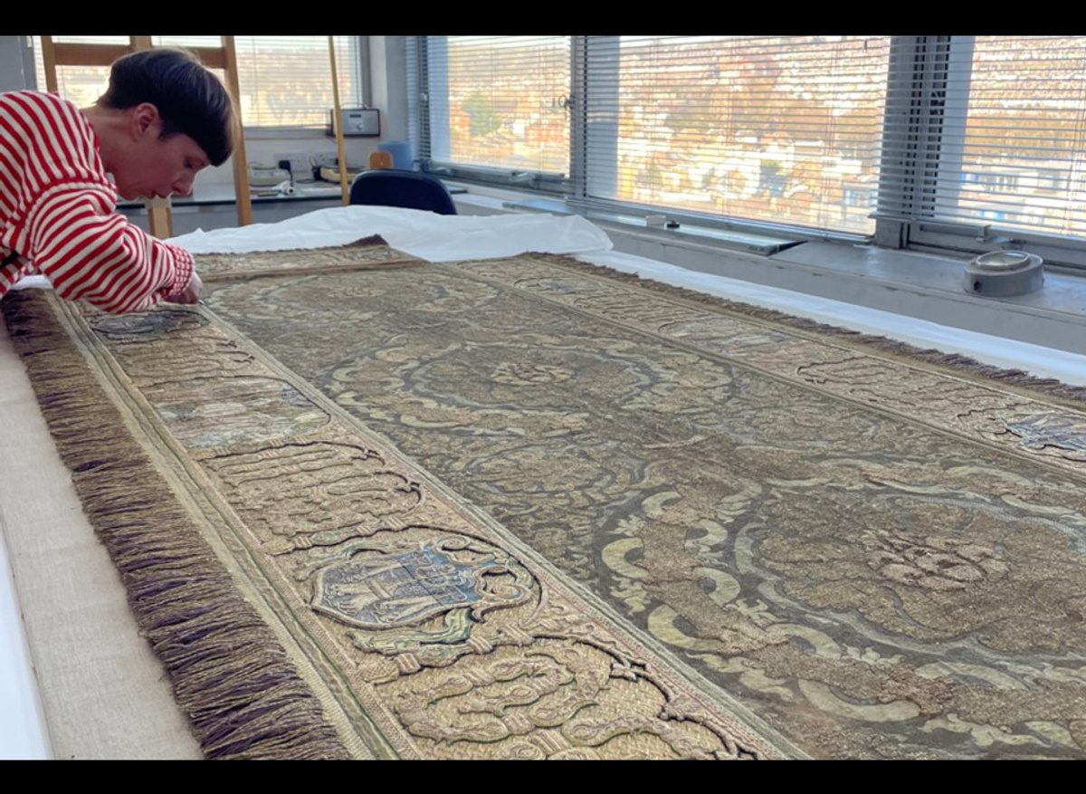 Conservation of a Merchant Taylors' Funeral Pall with intricate embroidery and fringed edges