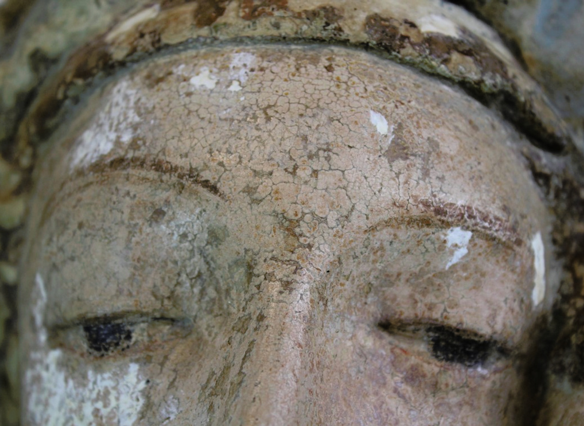 During conservation: fixing, filling and adjusting previous retouching