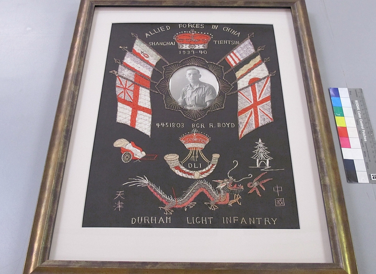 Commemorative embroidered textile - after conservation
