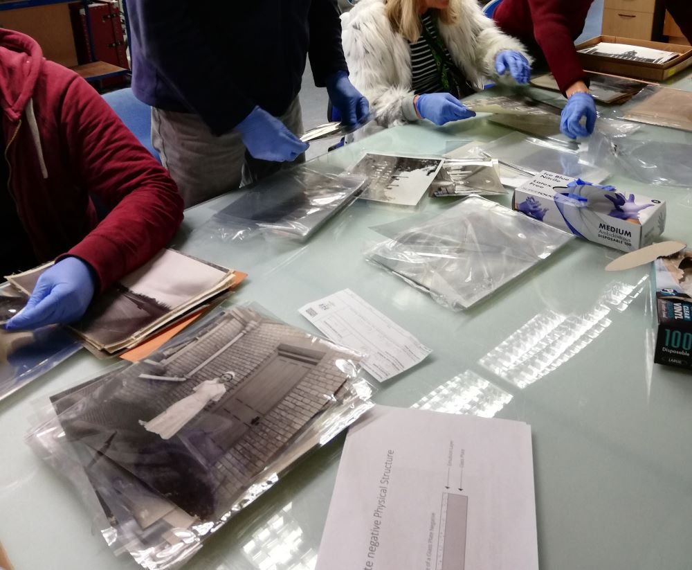 photos into polyester hands - restoration trust.jpg