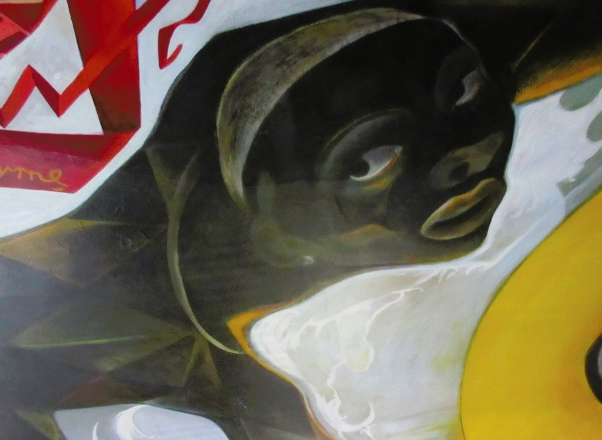 Harlequin figure detail after conservation treatment.