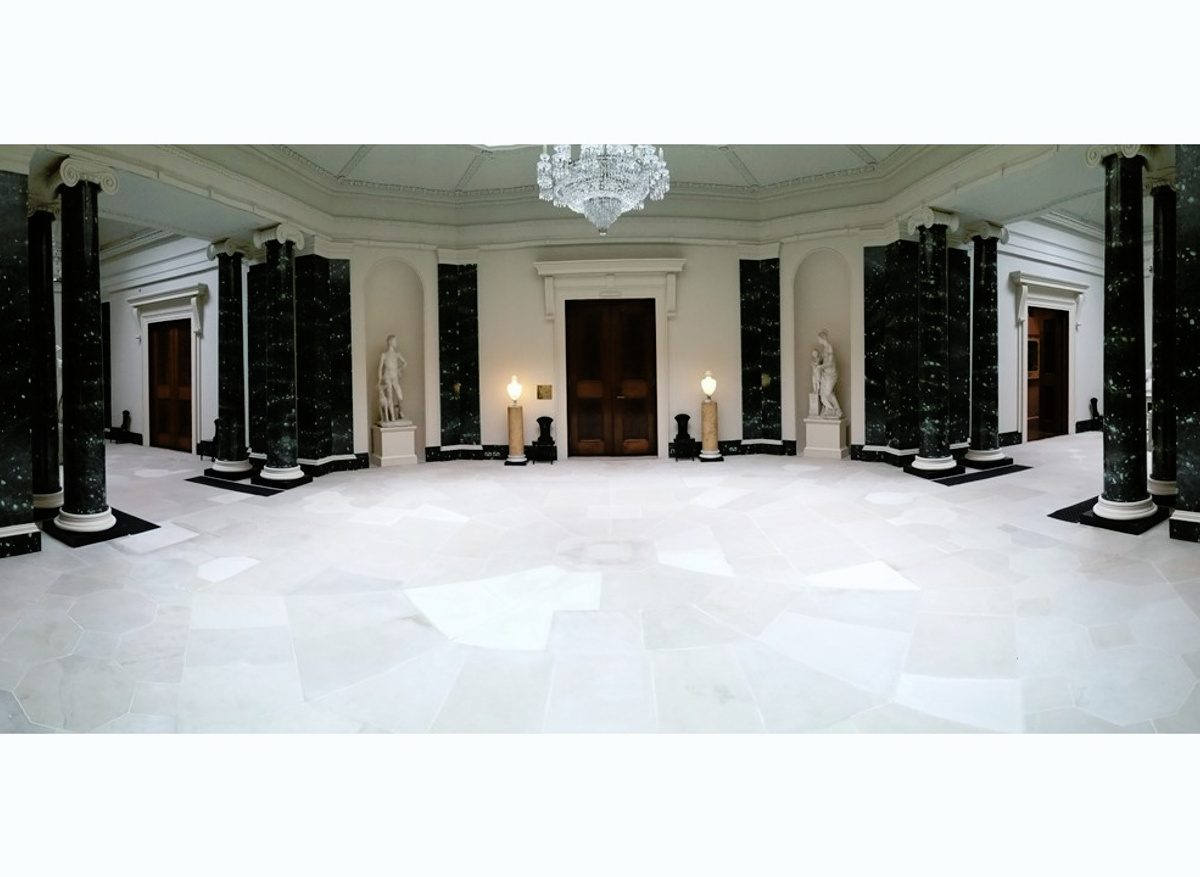 Removal of 1960s lino/bitumen floor covering to reveal 1820s Scrabo stone floor beneath