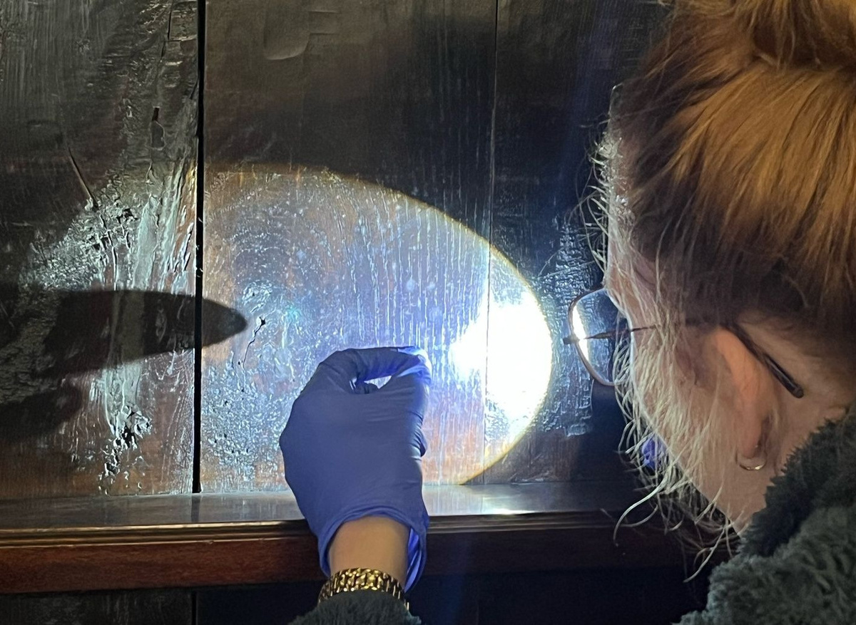 Checking props for mould and insect pests pre filming.