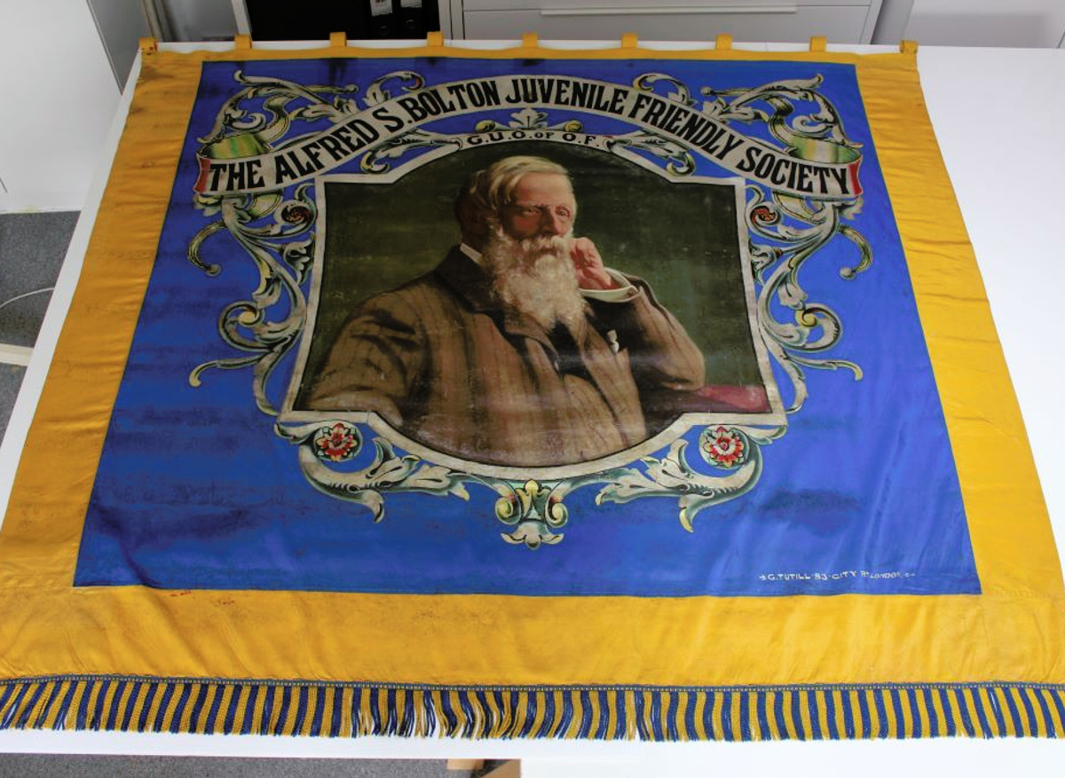 Overall of Alfred Bolton banner after conservation
