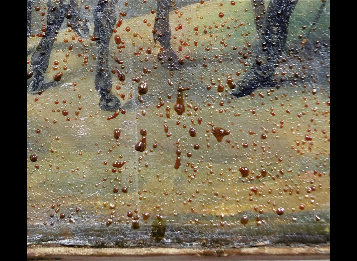 Animal glue softened by water damage oozed through cracks and hardened on the paint surface. 